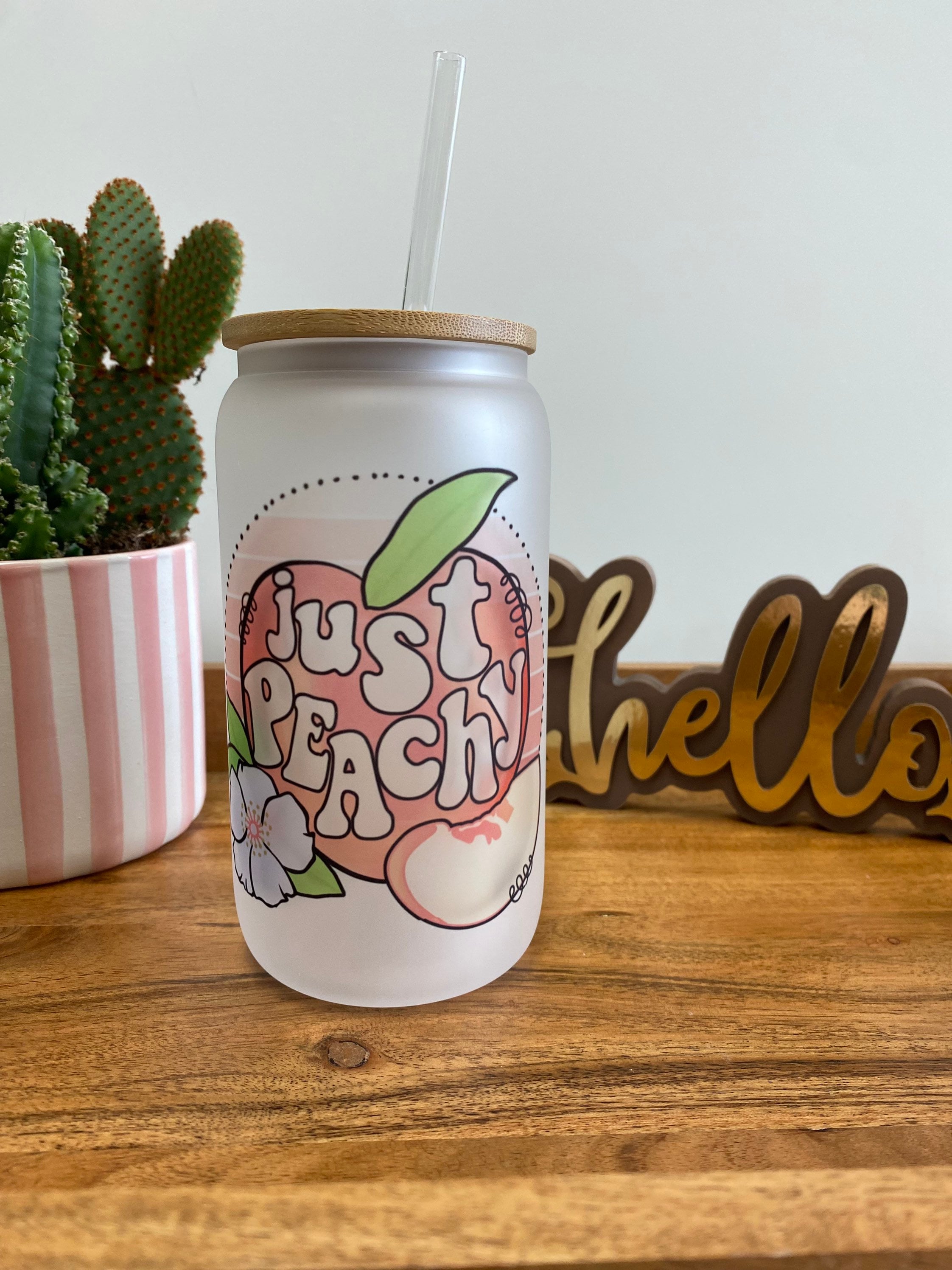 Just peachy – frosted can shaped glass with lid and straw