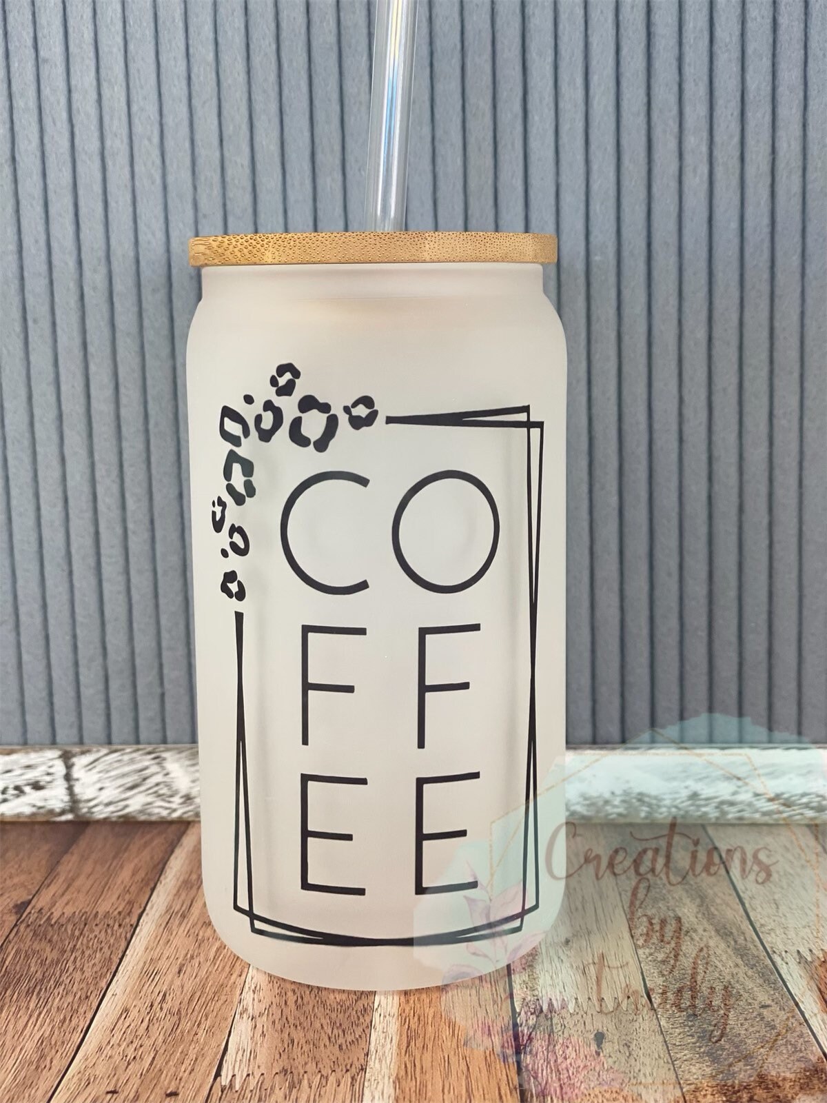 Coffee with boarder- frosted can shaped glass with lid and straw