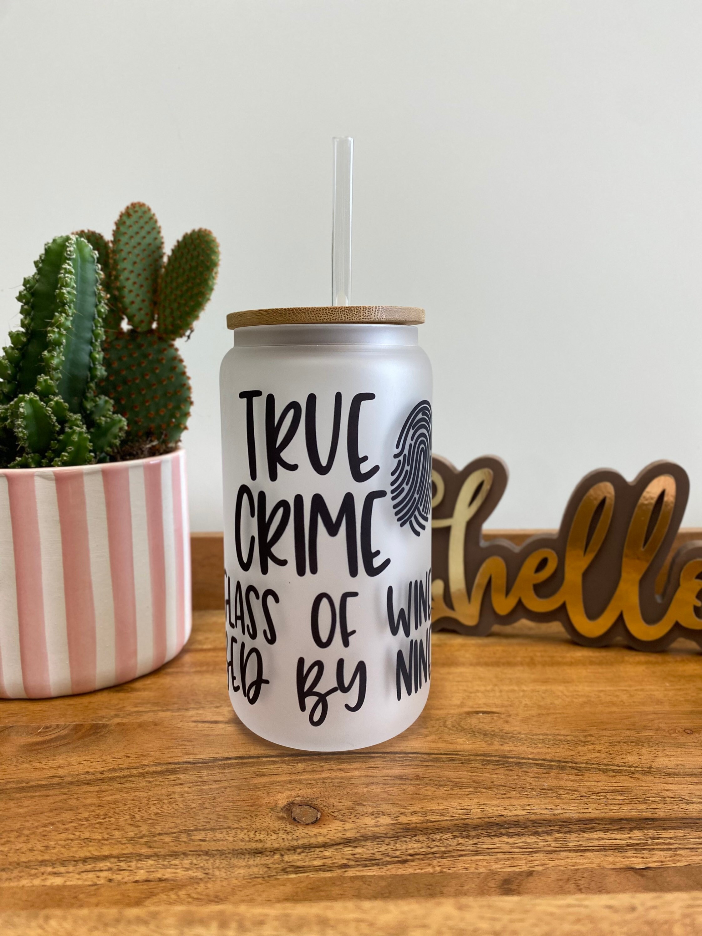 True crime glass of wine bed by nine- frosted can shaped glass with lid and straw