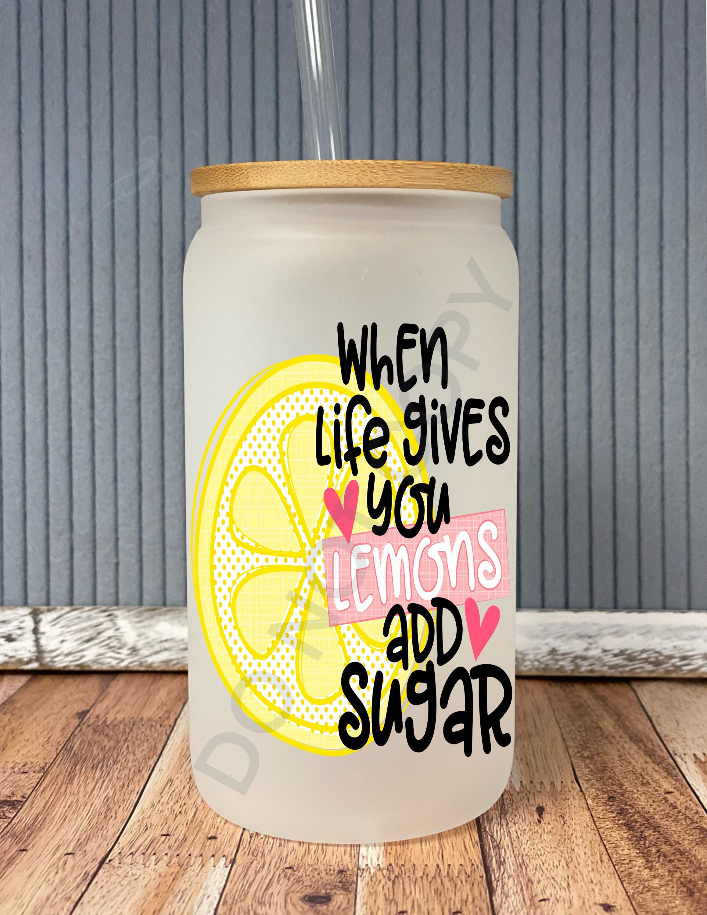 When life gives you lemons, add sugar- frosted can shaped glass with lid and straw